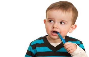 Child with Toothbrush in His Mouth O'Fallon IL